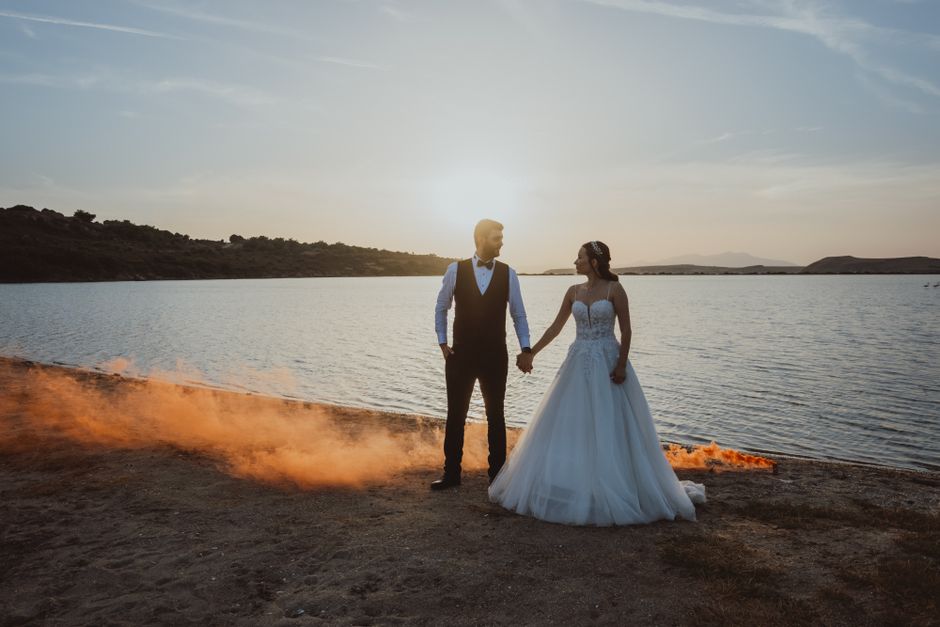 Romantic couple at sunset showcasing elegant wedding photography